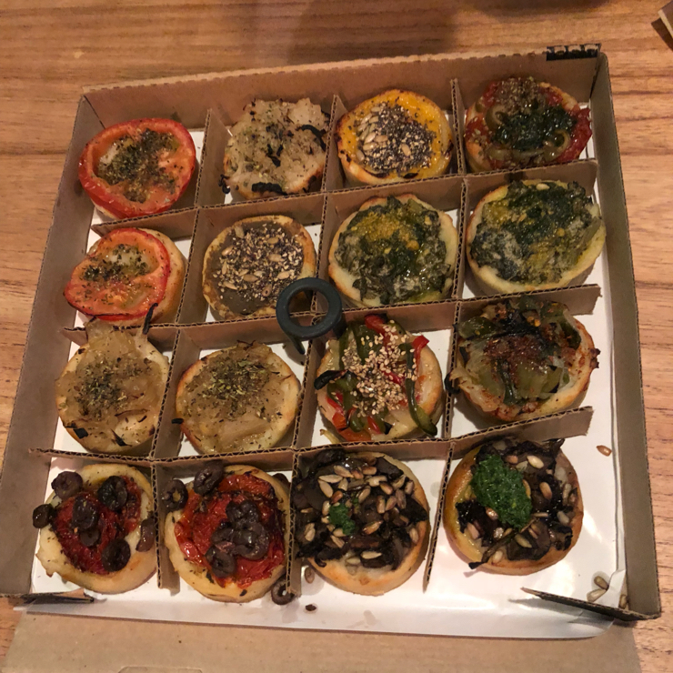 Vegan user review of Pizza Vegana - Puan in Buenos Aires. 16 mini pizza sampler