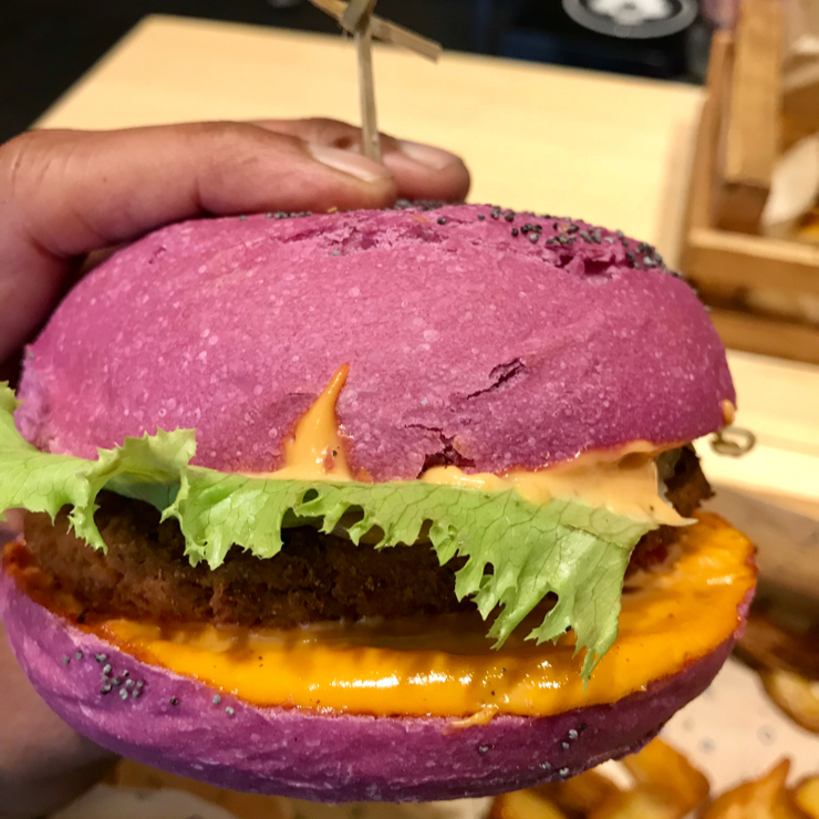 Vegan user review of Flower Burger in Roma. Cherry bomb vegan burger. The bun color is natural and made from beet.